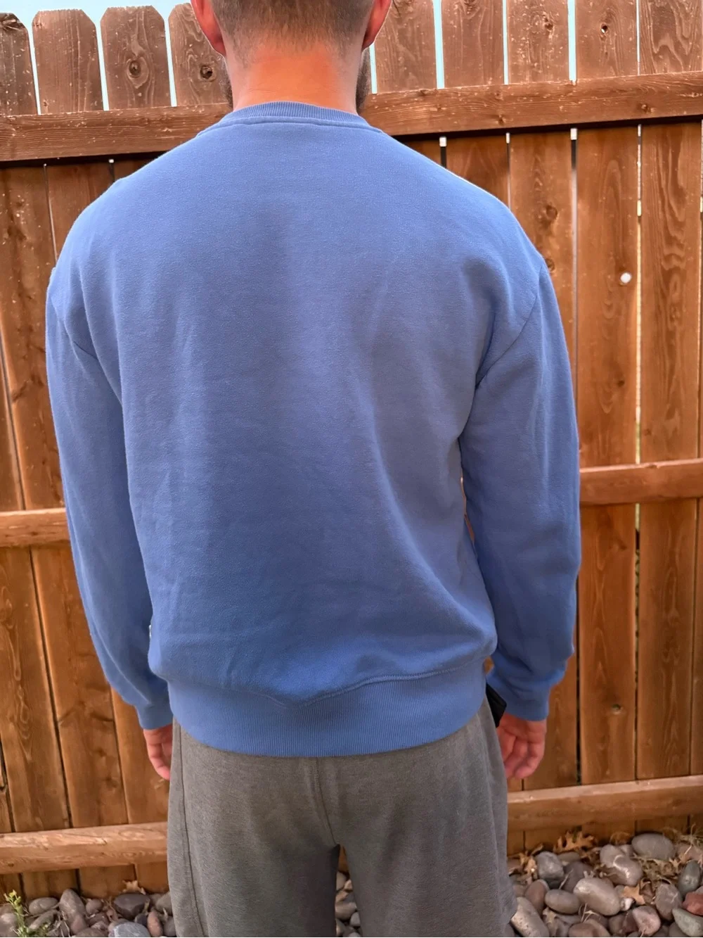 cotopaxi blue crewneck sweater with multicolor stripe logo